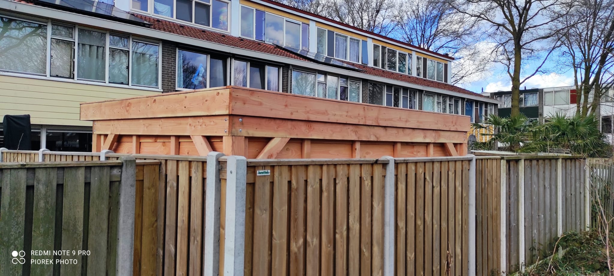 Overkapping met glazen schuifwand